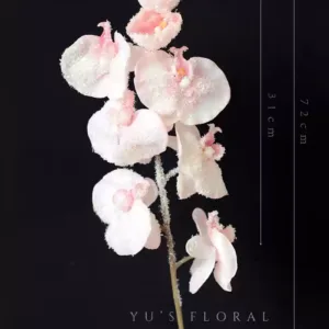 Artificial flowers with a Christmas atmosphere. Red and pink flowers with glittering powder on the surface. They will fall off. Be careful when photographing window flowers. - Phalaenopsis - pink with artificial snow on the surface