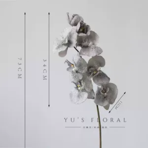 Artificial flowers with Christmas atmosphere. White and gray artificial snowflakes with glitter powder on the surface. Chips will fall off. Be careful when photographing. - Phalaenopsis - gray with artificial snowflakes on the surface